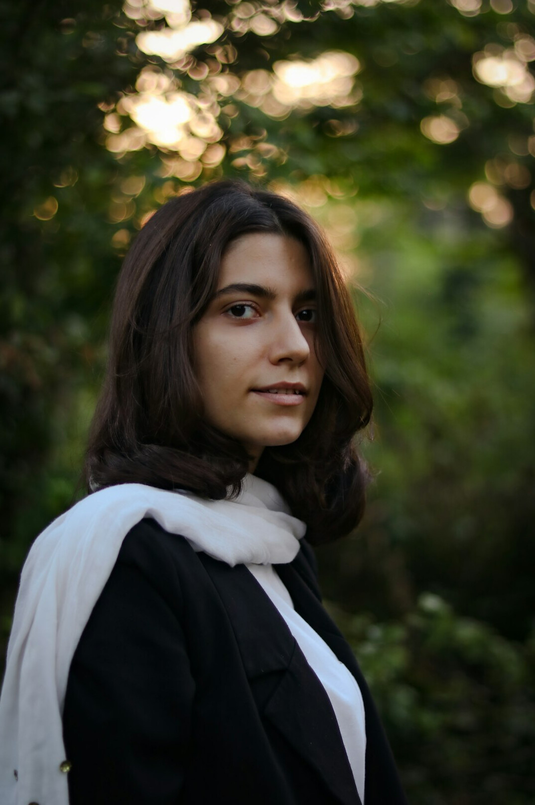 Studio portrait of a Croatian woman with shoulder length hair in a blazer