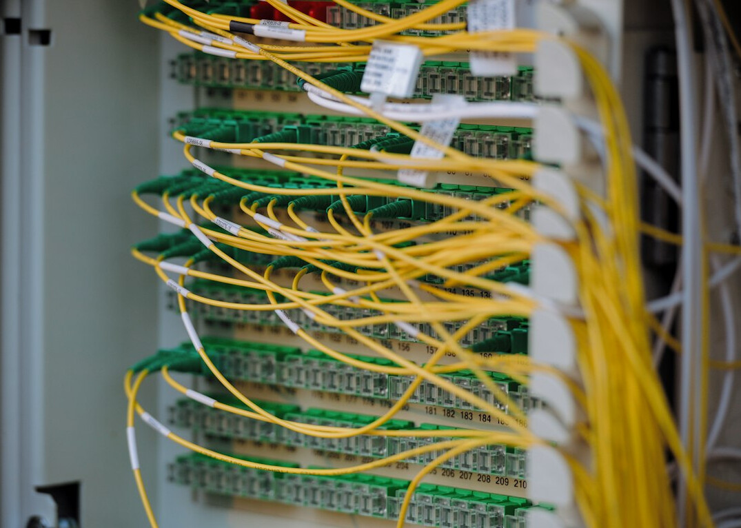 Rows of server racks with blinking lights in a data center