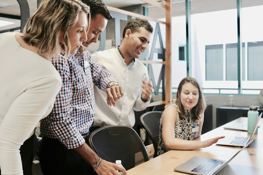 business team discussing software